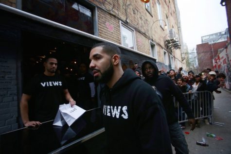 Drake hands out merchandise to fans to promote his new album