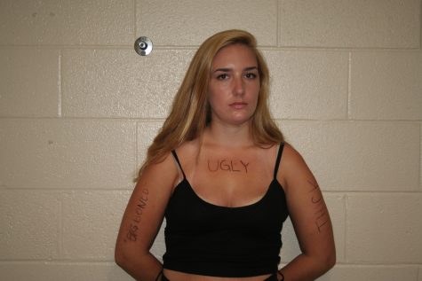 Maggie Dwyer models hateful words said to her about her body
