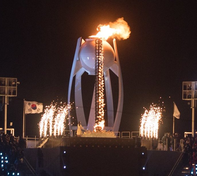 A+South+Korean+figure+skater+plays+a+huge+role+in+the+opening+ceremonies+of+the+Winter+Olympics+by+being+the+last+to+hold+the+Olympic+torch%2C+and+by+lighting+the+Olympic+cauldron.