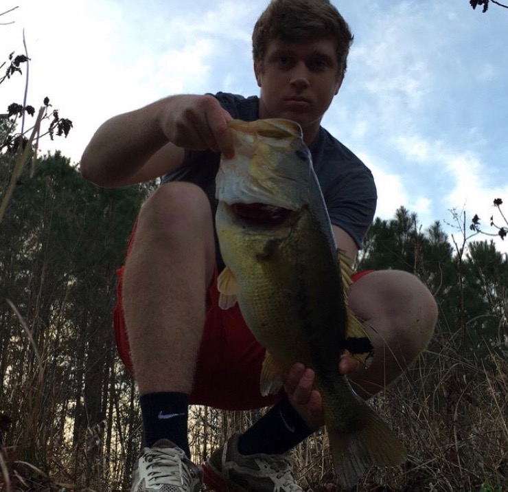 Enjoying some alone time, Chase Smith shows off his monster catch at a pond off of Centerville.