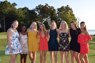 Senior field hockey girls clean up nice for their final homecoming.