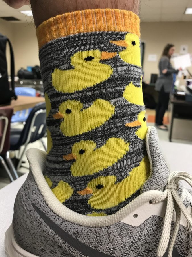 Rubber ducks can be a festive design you can put on socks