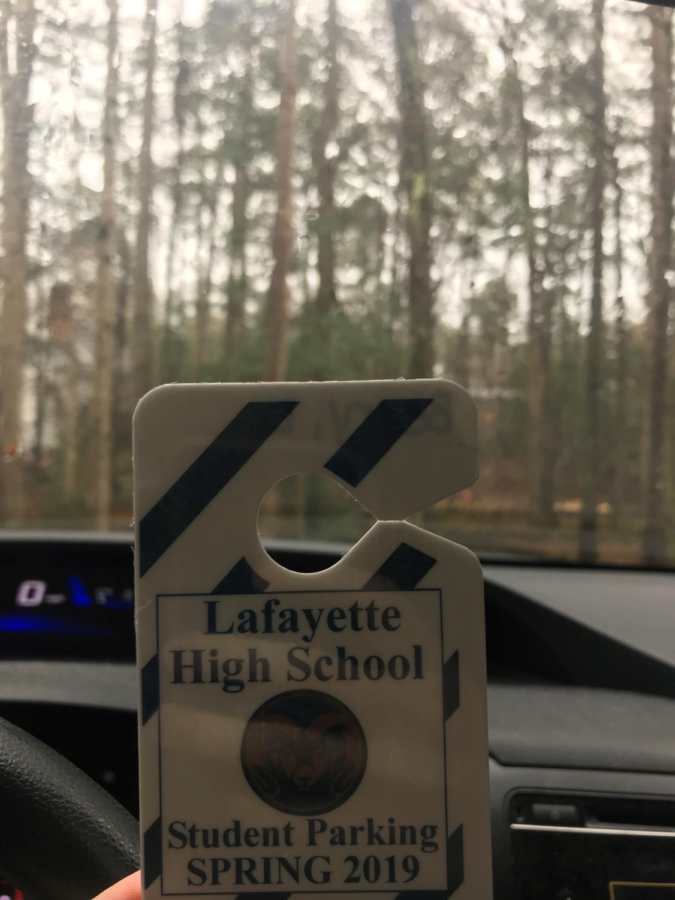 At LHS, its required to get a parking pass to park in the student parking lot.