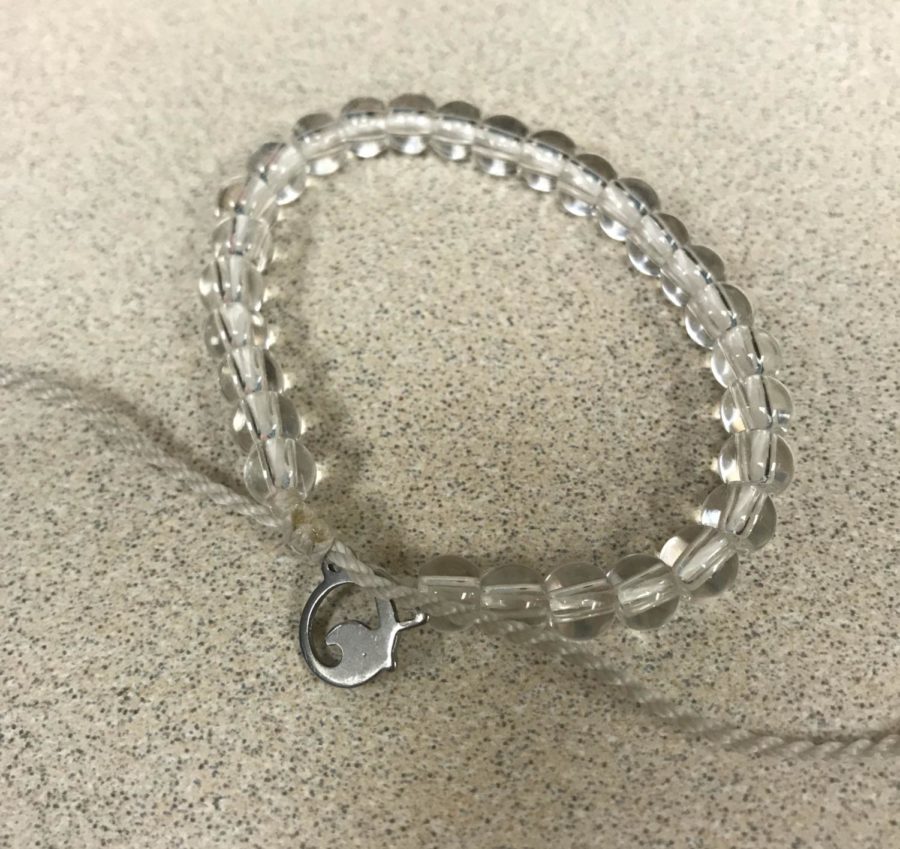 This is a ocean bracelets logo on the end of the bracelet. 