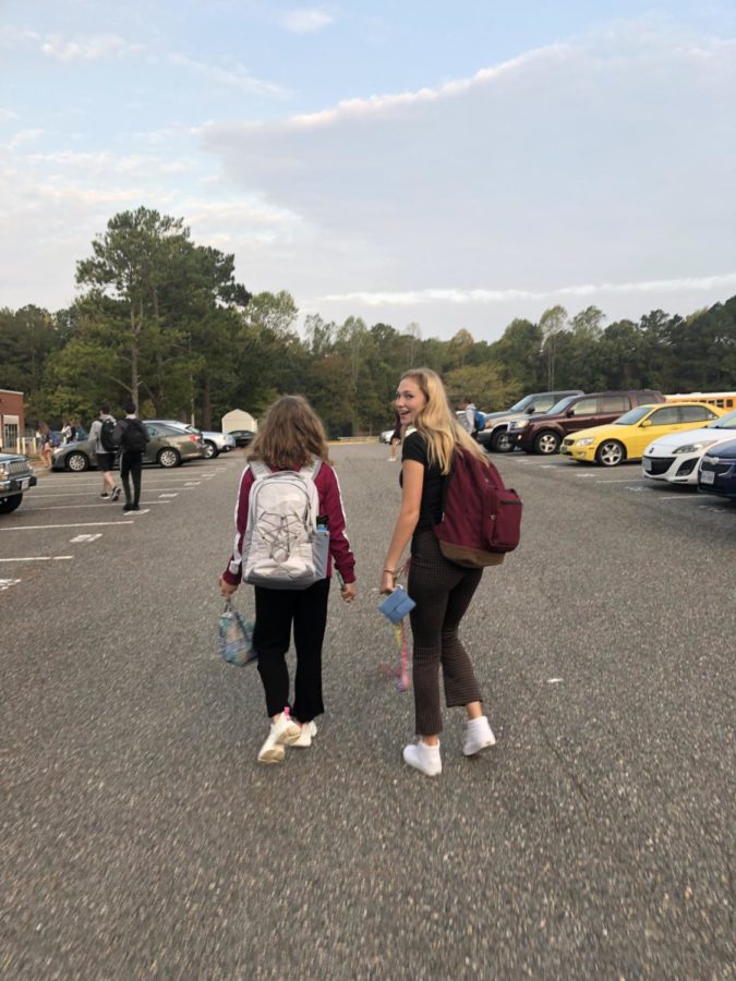We step outside the car and acknowledge the crisp Autumn air- its only this fresh in the early hours of the morning. The caffeine has yet to show itself; Emma and Genevieve move sluggishly across the parking lot, hoping that the time hits 2:20 before they reach the school doors. 