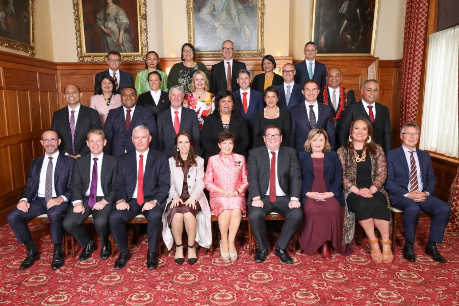 Prime Minister Jacinda Ardern, first row and fourth from the left, poses for a photo with her cabinet members. These new appointments come after Arderns reelection in a landslide victory last month.