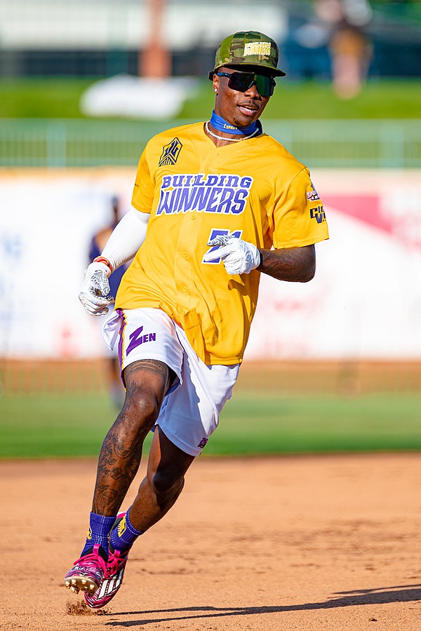 Henry Ruggs competes in charity softball games, in addition to his professional activities.