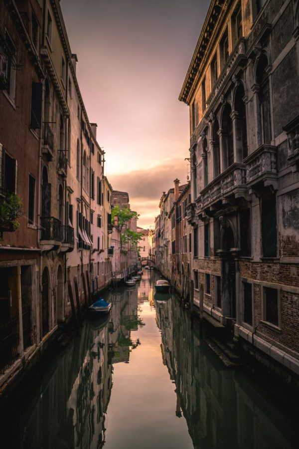 The beautiful city of Venice, Italy was one of the first powerful developing cities. Their unique town is all on water and they transport using small boats.