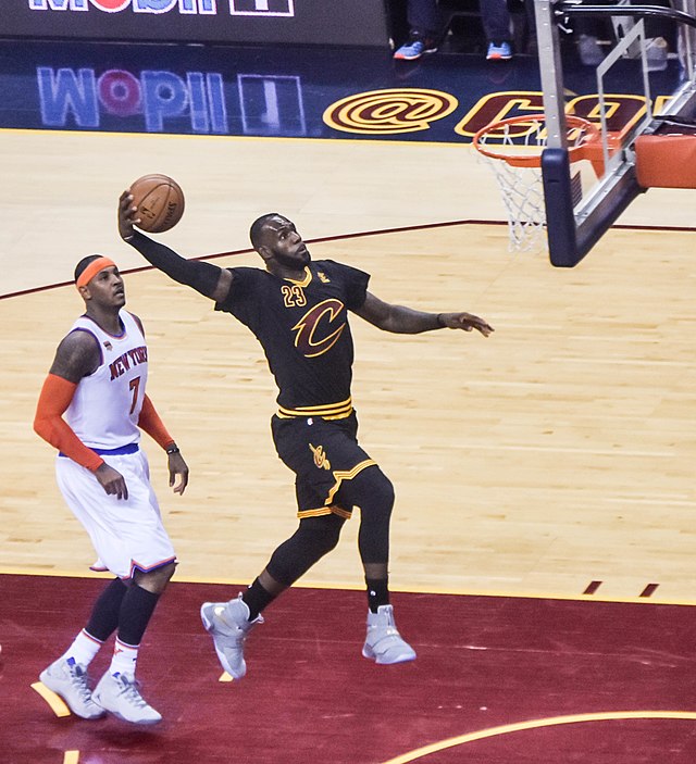 LeBron dunks with authority in a matchup against the Knicks of New York during his tenure as a Cavalier. 