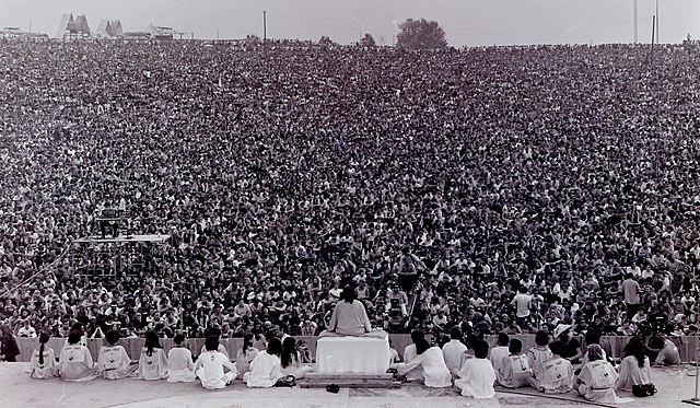 Many people gathering together for peace at Woodstock 69