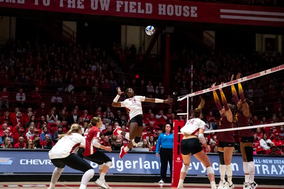 Wisconsin Outside Hitter, Temi Thomas-Ailara gets ready to hit the ball in the highly anticipated match against Minnesota. 