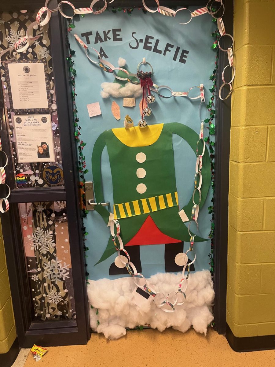 Mrs. Van Wingerden shows a clever play on words by having her door say Take a S-Elfie, and having a elf on the door!