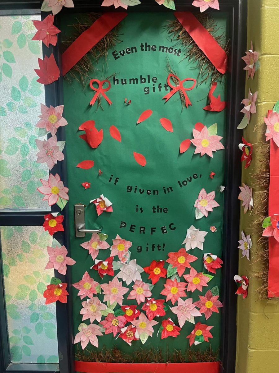 This door has a hearrt warming message on it, saying Even in  the most humble gift if given in love, its the perfect gift!