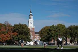 Dartmouth College stands as a background. The Ivy League School is the first to bring back the standardardized testing policies