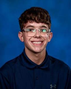 Joshua Hill smiling big for 11th grade picture day.