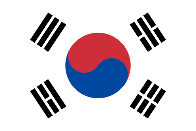 Shown in this image is the flag of the Republic of Korea, the South Korean flag has red, blue and black stripes. Photo from wikimedia