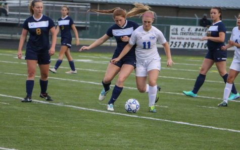 Senior captain Emma Shenk battling York player for possession of the ball 