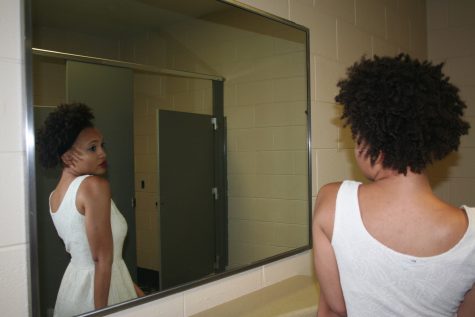 Ayanna Coan models after doing her make-up