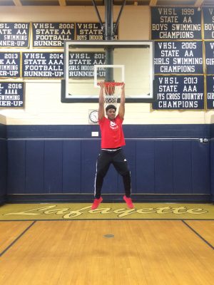 Queshon going for a reverse dunk