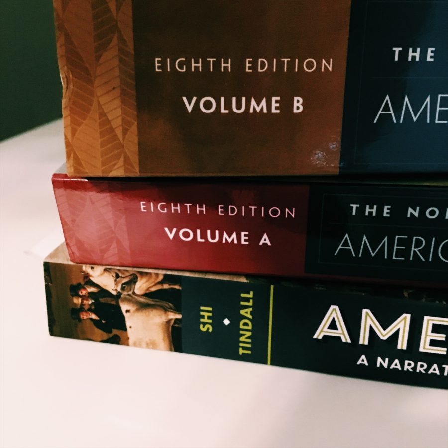 Just a few of the textbooks required for college courses. Photo Courtesy of Madison Sybert.