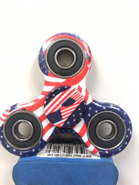 A fidget spinner adorned with American flags