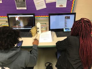 Students pass time by watching movies in class.