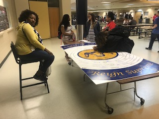 LHS soon-to-be almuni sign the Senior Board as a farewell and leave their legacy.