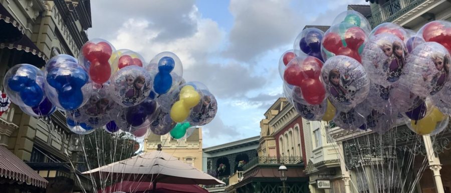 Held down by trusted employees are Disney's unique and quite famous balloons that can be purchased for ten to fifteen dollars that are warranted if they deflate during the visit at any of their parks and fly nice and high for a long time.