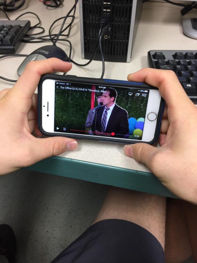 Will Darling, enjoying an episode of Netflix's hit-TV shows, The Office, in class.