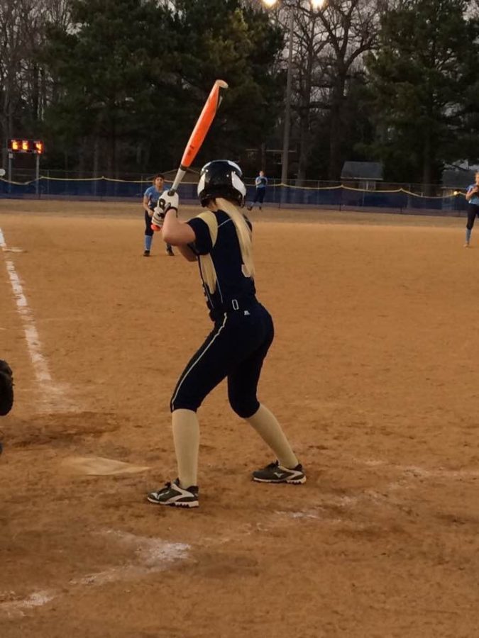  Starting shortstop and Lafayette Junior Casey Cole is focused while up to bat against the Warhill Lions. As Casey Cole waits for the pitch, she gets into her ready stance.