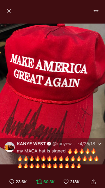 Kanye showing his love for the president with his signed MAGA hat.