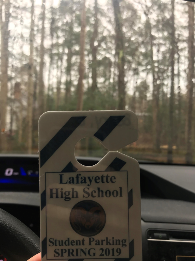 At LHS, it's required to get a parking pass to park in the student parking lot.