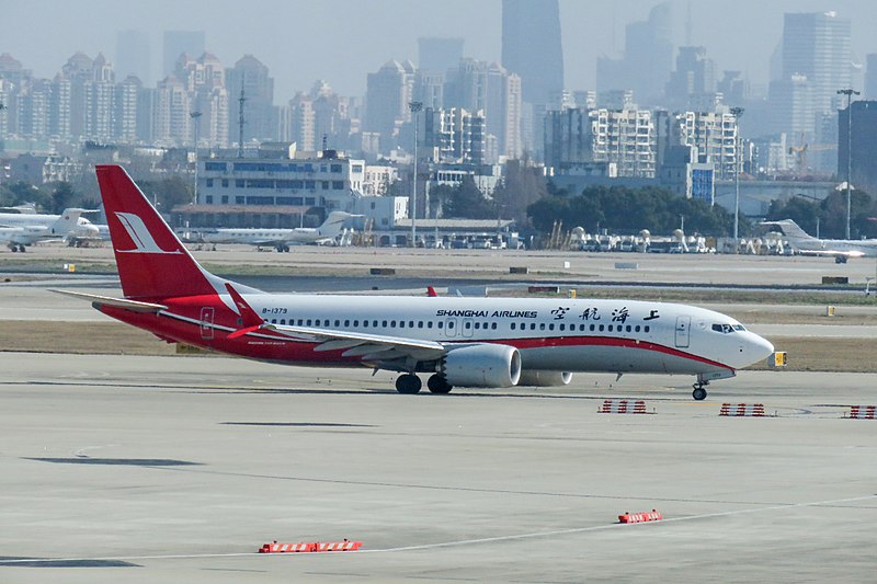 A Shanghai Airlines Boeing 737 MAX 8, the same model as Ethiopian Airlines Flight 302, taxis down the runway at Shanghai Hongqiao International Airport.