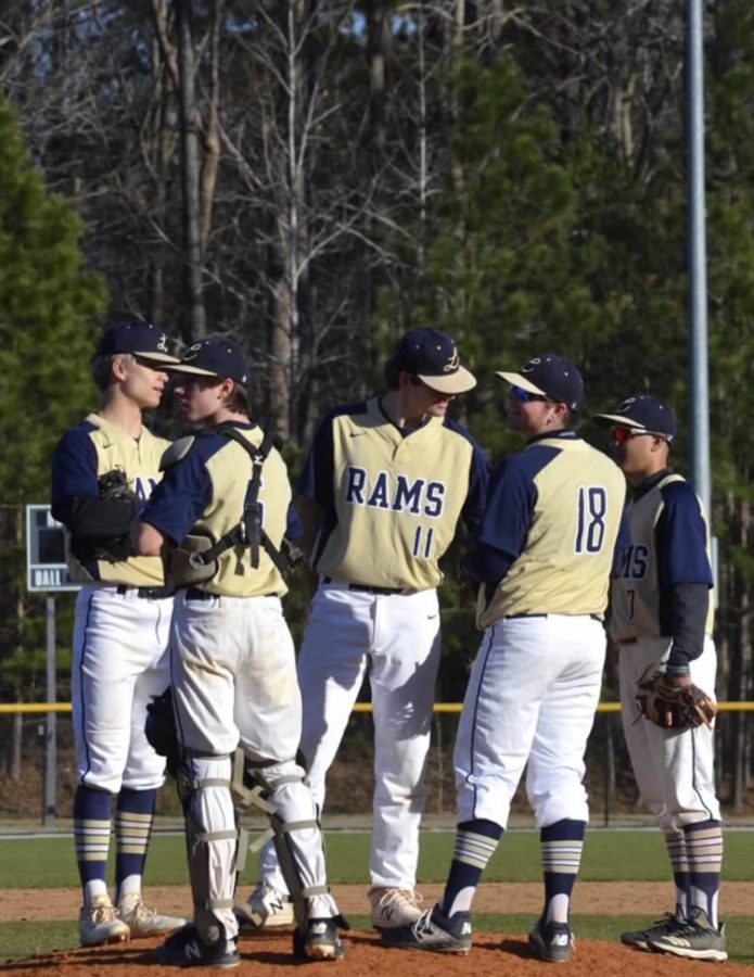 The Lafayette Rams take a timeout on the mound to make sure all of their signs are correct. The Rams need to make sure that their communication is in cinque so they are able to make the defensive plays during the game. 