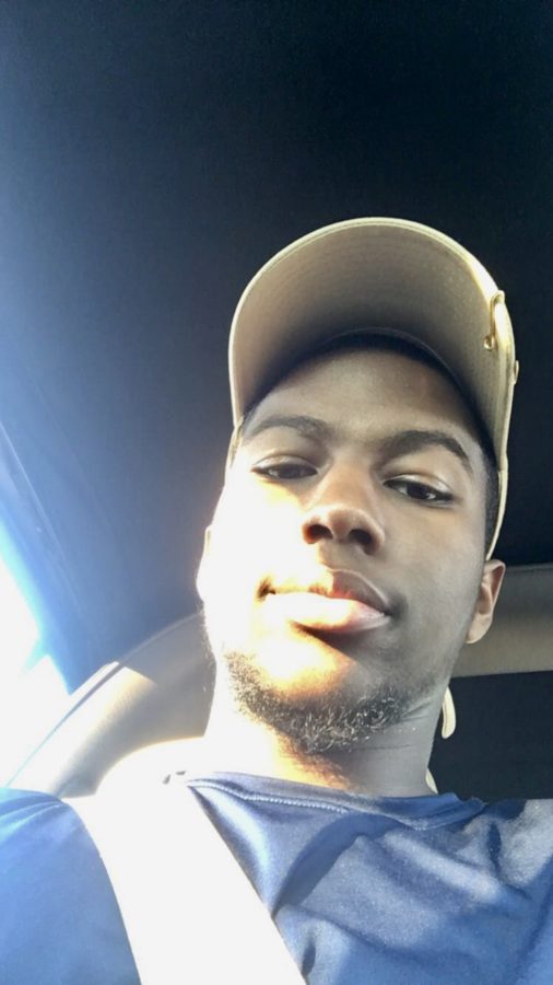 On his way home from school, Timmy snaps a selfie to remember his high school days. 