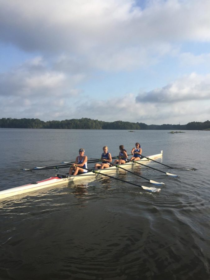 The women's quad makes its way to the starting line. These rowers have been  practicing every weekday for two hours at Chickahominy State Park.