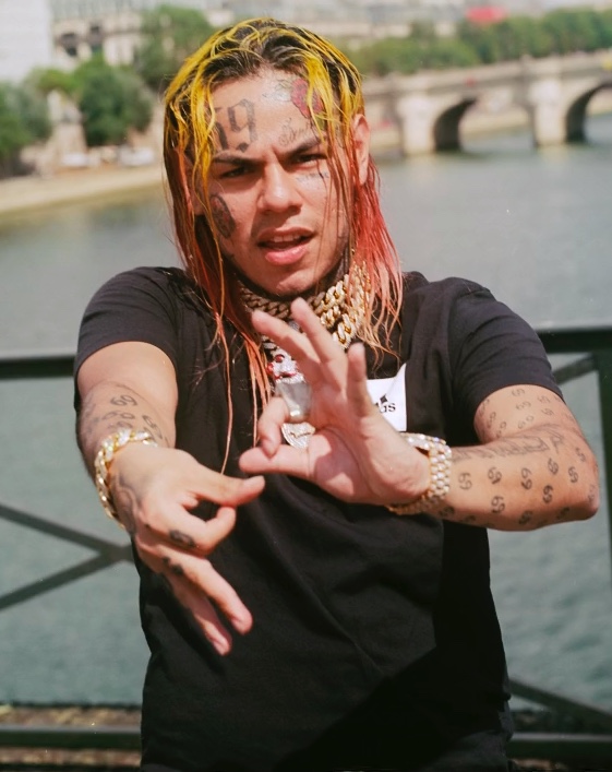 Daniel Hernandez is a rapper who is charged for racketeering. He has many tattoos that say '69' it means the number of letters in his first and last name. Daniel is 6 letters and Hernandez is 9 letters.