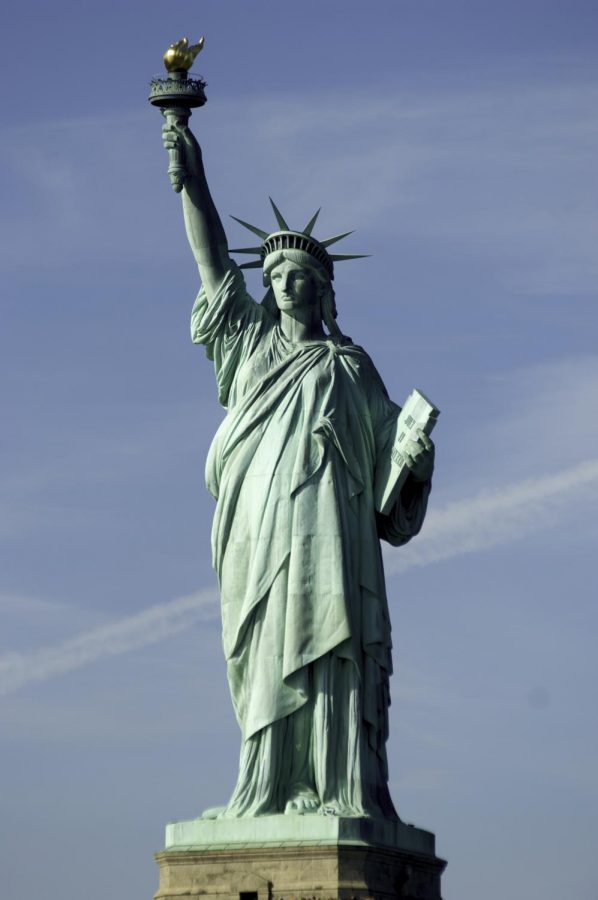 Once a symbol for economic freedom, Lady Liberty watches as America's middle class is slowly destroyed.