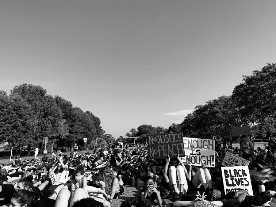 Lying on the cement ground as George Floyd did when he died, protesters fight for justice of all of the lives lost to police brutality.