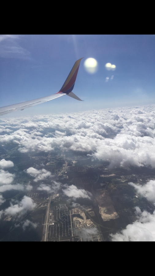 here you are looking at a plane. You are also overlooking the land hundreds of feet under, as we are in the clouds. 