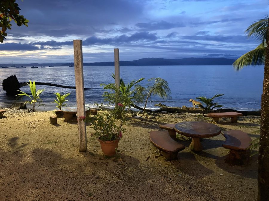 Sunset at the beach of Puerto Jimenez after a walk in Costa Rican nature. 