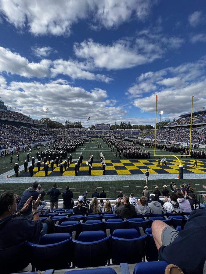 Before the game with all the mids lined up in formation performing. There were around 600 mids throughout the 32 companies. 