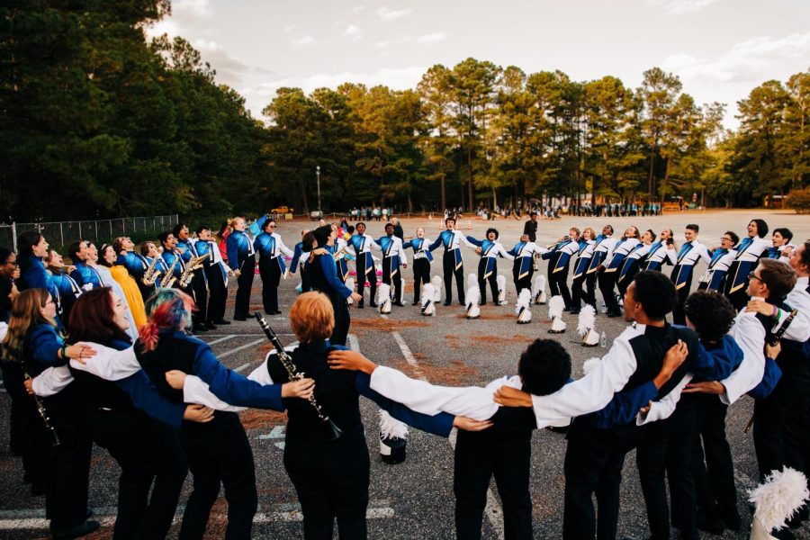 The marching rams hyping themselves up before performing.