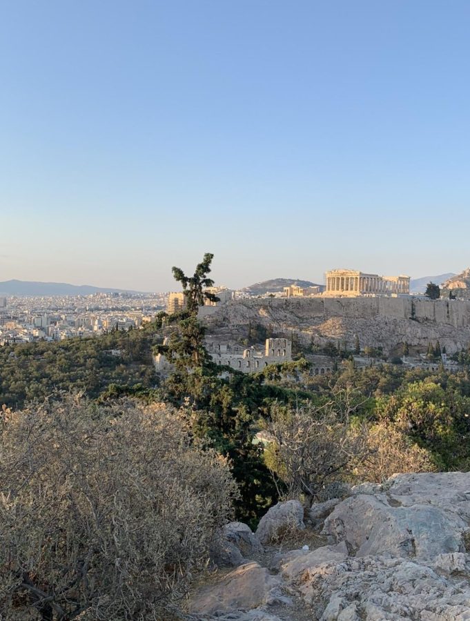 Parthenon from Afar - The Parthenon is a temple dedicated to the Goddess Athena, howstuffworks says that it is 500 feet above sea level. Sitting on a massive plateau, the temple itself is almost 50 feet tall and in the center of the Acropolis of Athens. The height and size of the temple allows it to be seen from just about any rooftop in the city. The Acropolis is one of Athens' main tourist attractions and people from all over the world to see the temples and theaters it homes.