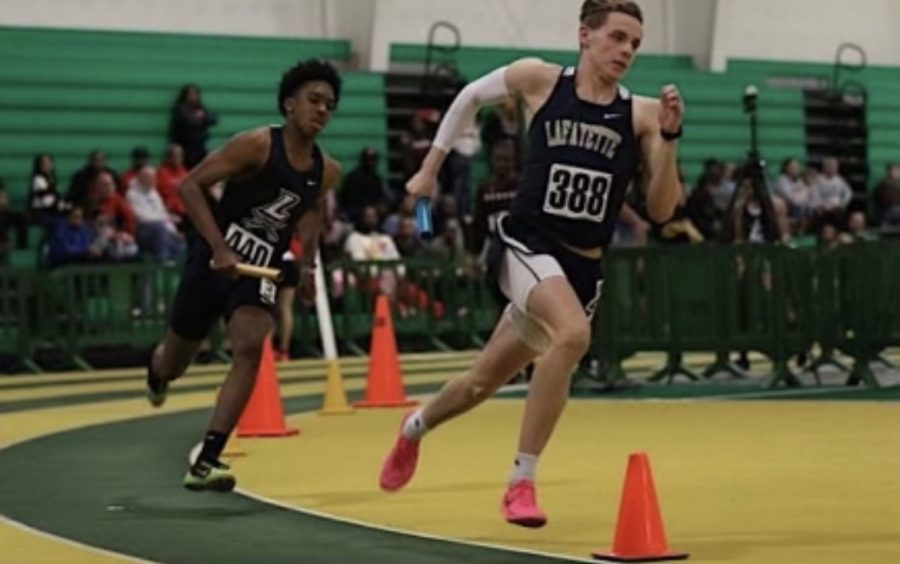 Braden Lee running in the 4x400 relay. His relay would get 3rd in regionals and qualify for states.