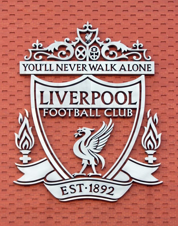 Liverpool's badge with the iconic "You'll Never Walk Alone" fraise that the club has used since the beginning in 1892 that you can also see on the badge.