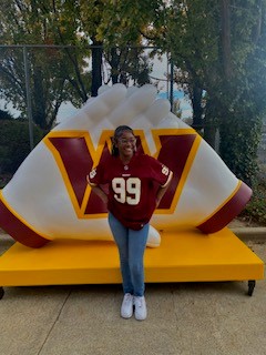 I'Tyra Garris at the football game supporting the Washinting Commanders