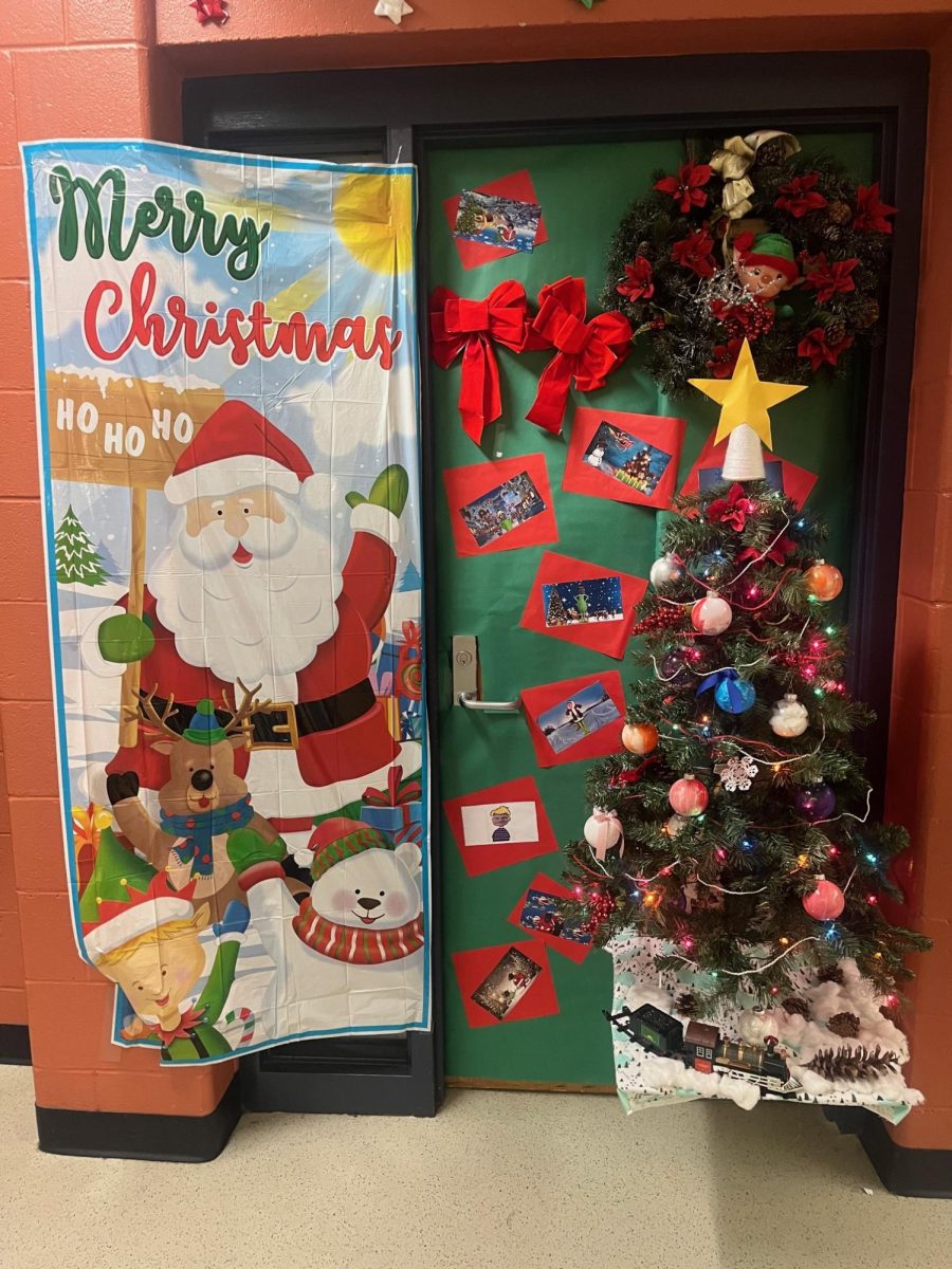 Mrs. Nickerson's creative design is showing! With an entire Christmas Tree attached to her door, she shows how interesting she and her class can be!