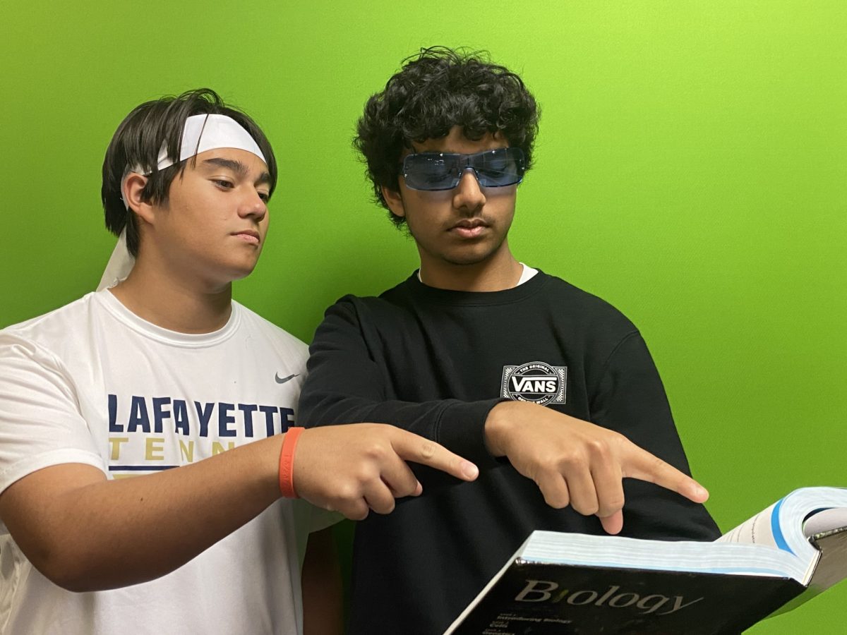 Xavier Jones (Left) and Rishi Vora (Right) before match day last year. This duo has played together for almost their entire life and have great chemistry on court. Picture taken by Wesley Muse. 