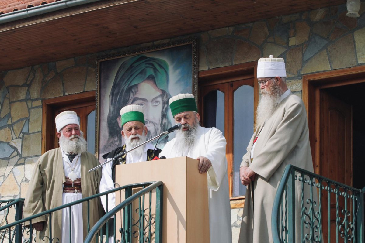 Bektashi Clerics speaking at an event.